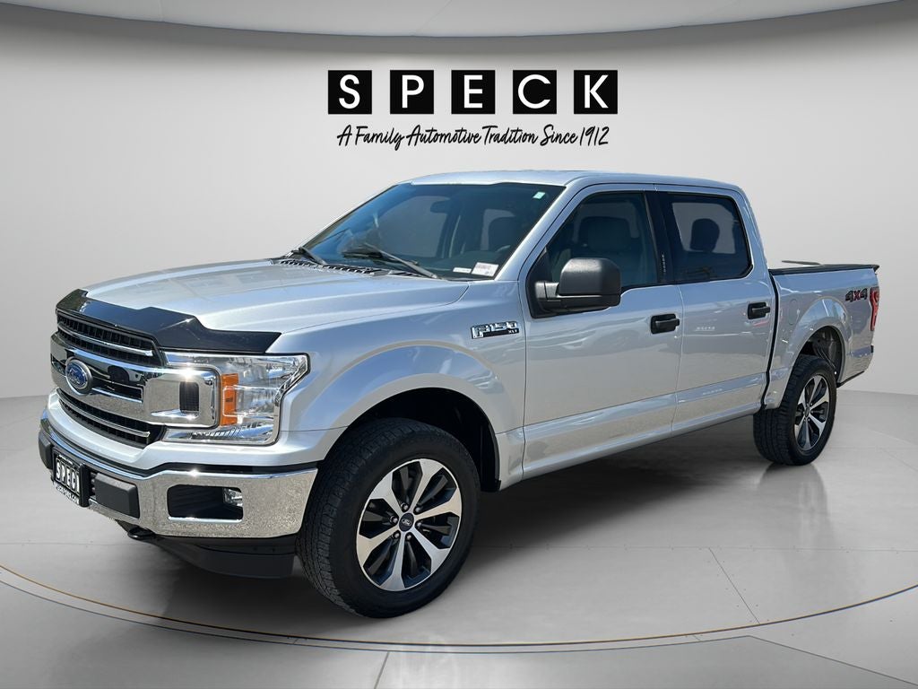 2018 Ford F-150 XLT in Ingot Silver Metallic — front three-quarter view