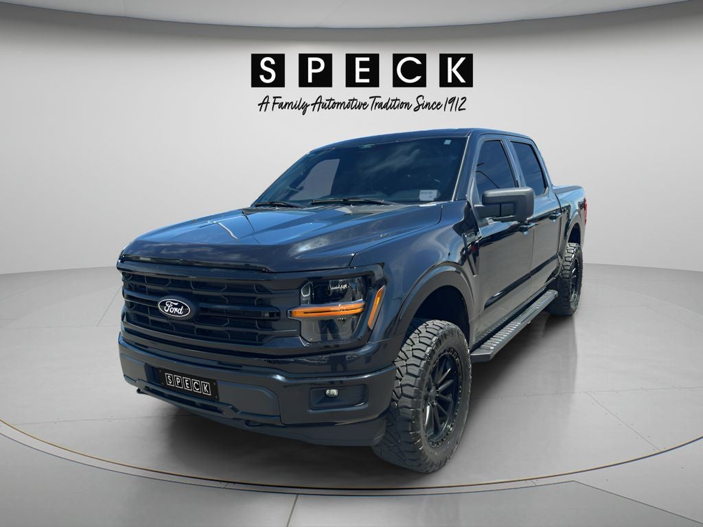 2024 Ford F-150 XLT in Black — front three-quarter view