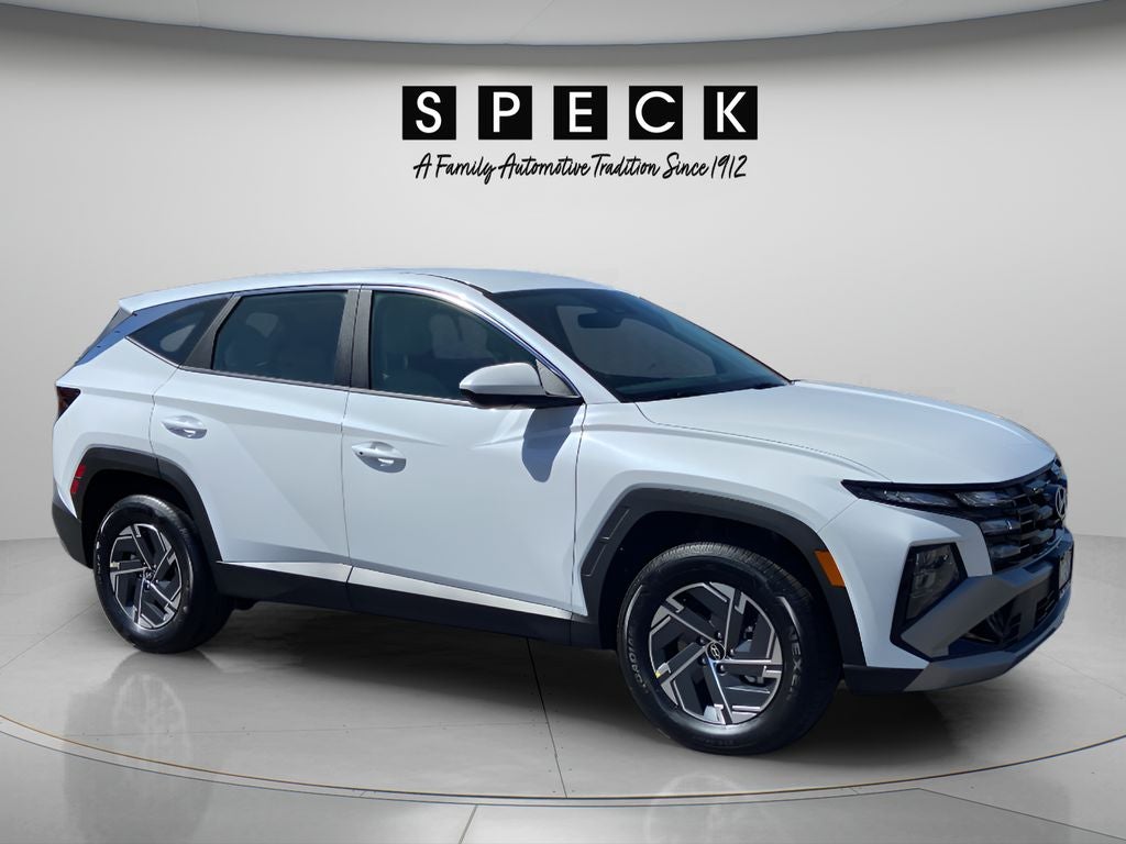 2026 Hyundai TUCSON Blue SE in Creamy White Pearl — front three-quarter view